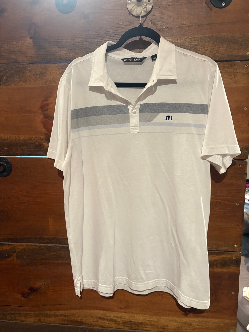 Travis Mathew White Polo with Gray Chest Stripes